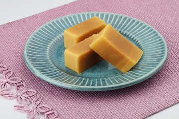 Mysore pak, a traditional, popular, and delicious sweet dish native to the city of Mysore, Karnataka, India, is made from ingredients like gram flour, ghee and sugar
