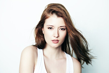 Fototapeta premium Shes got an air of confidence about her. Studio portrait of an attractive young brunette woman.