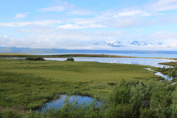 Fototapeta na wymiar Island - Landschaft Skjalfandibucht mit Flateyjarskagi / Iceland - Landscape Skjalfandi Bay with Flateyjarskagi /