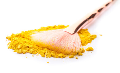 Makeup brush and loose eye shadow on white background