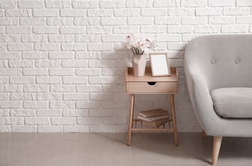 Modern interior of room with table and armchair