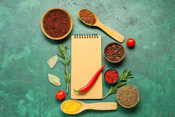 Composition with blank notebook, spices and vegetables on color background
