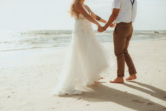 Bride and groom on the beach