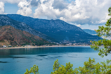 The Bay of Adrasan extends along more than 2.5 km of Antalya, naturally protected area, surrounded by a national park with pine forests, Taurus Mountains, blue water lagoons and sandy beaches.