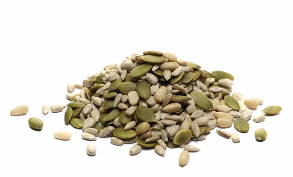 Mix Seed, Pumpkin Seeds, Sunflower Seeds And Pine Nuts Isolated On White