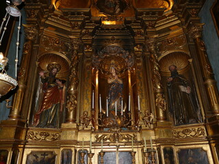 Fototapeta na wymiar Representations of saints in a side altar of the parish church of Sant Bartomeu, Soller, Mallorca, Balearic Islands, Spain