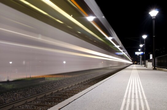 Railroad Station with a Train in Long Exposure in Ticino, Switzerland.
