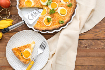 Delicious Easter tart with eggs on wooden background