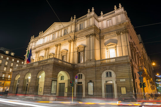 Scala Theater on Piazza della Scala at Night with Light Trails in Milan, Lombardy in Italy.