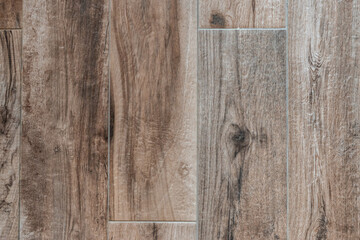 Stone tile planks with wood grain texture used for wall and floor.