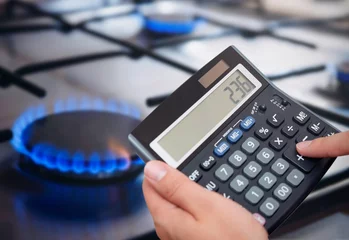 Fotobehang Gas kitchen stove. Electricity bill calculation © Proxima Studio