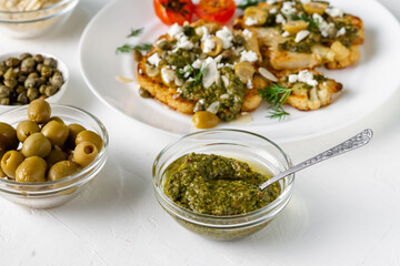 Chimichurri sauce made from parsley, cilantro, oregano, chenosk and olive oil. Vegetarian food concept.