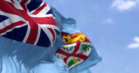 Detail of the national flag of FIji waving in the wind on a clear day