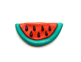 plasticine watermelon on a white background 