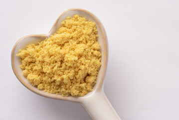 Chicken Base on a Heart Shaped Spoon