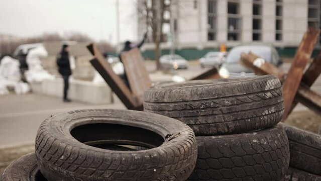 Ukrainian army is preparing to repel attack of russia. Ukrainian and russian war weapons. Police officers stand guard at border post between the republic. Car traffic
