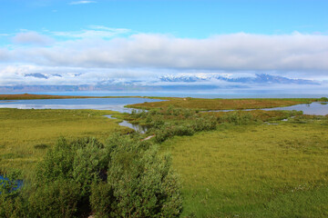 Fototapeta na wymiar Island - Landschaft Skjalfandibucht mit Flateyjarskagi / Iceland - Landscape Skjalfandi Bay with Flateyjarskagi /
