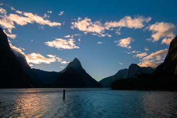 Sunset landscape Fiordland New Zealand, Mitre peak Milford Sound panoramatic scenery