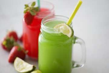 Strawberry juice and kiwi and green lime juice smoothie