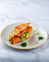 Croissants with soft cheese, salted salmon and green salad