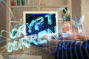 Double exposure of woman hands typing on computer and crypto market theme hologram drawing. Blockchain concept.
