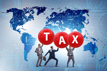 Tax burden concept with businessmen