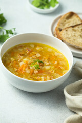 Traditional pea soup with smoked bacon	