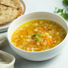 Traditional pea soup with smoked bacon	