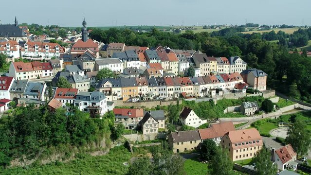Aerial drone flight over a little village in the east of Germany waldenburg