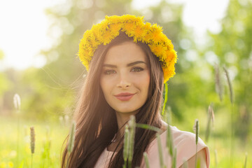 Pretty young woman enjoying the spring sun