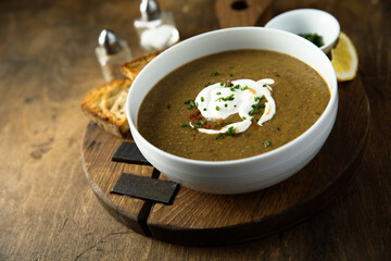 Homemade creamy lentil soup with herbs