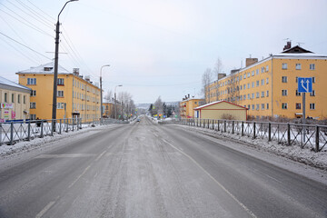 MEDVEZHIEGORSK, REPUBLIC OF KARELIA, RUSSIA, JANUARY 07, 2017: Streets of the city of Medvezhyegorsk with soviet houses in the winter season