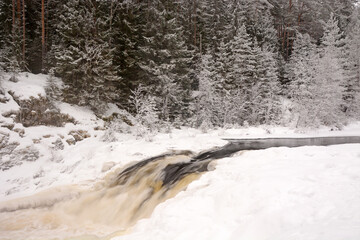 The pearl of Karelia Republic- Kivach waterfall at winter season