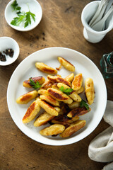 Traditional German potato dumplings with fried onion