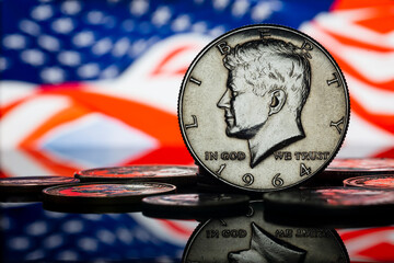 US Half Silver Dollar John Fitzgerald Kennedy 1964 American Flag Background Macro - obrazy, fototapety, plakaty