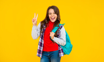 september 1. happy childhood. child with school bag. successful teen girl carry backpack.