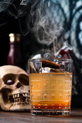 negroni cocktail, decorated with cinnamon orange and star anise