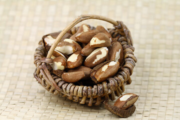 Open brazil nuts in the basket