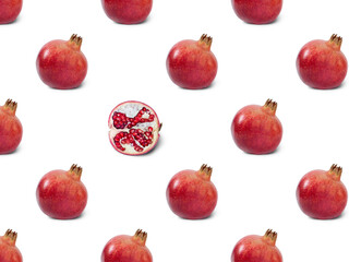 A pattern of fresh pomegranates on a white background .