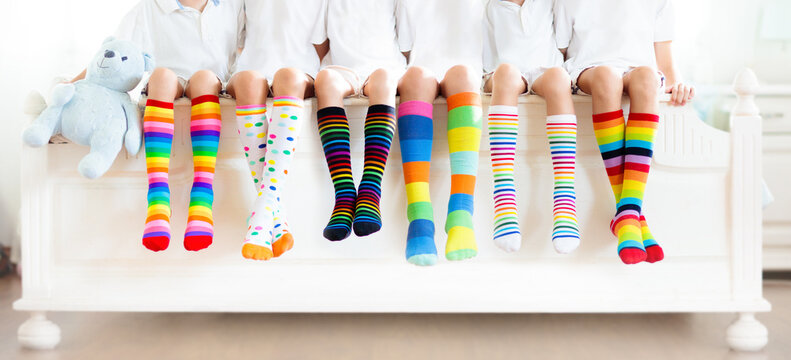 Kids With Colorful Socks. Children Footwear.
