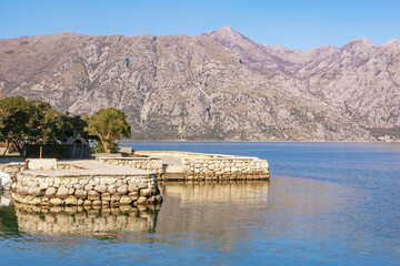 Obraz na płótnie Canvas Winter Mediterranean landscape. Montenegro, Adriatic Sea. View of Kotor Bay near Prcanj town