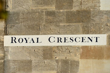 view an old street sign with the words 'royal crescent' at the landmark street in bath england