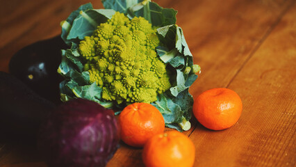 Diet vegetables on a wooden table