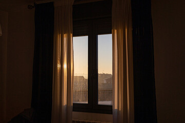  window on a sunny morning with white curtains background