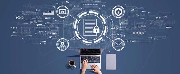 Data protection concept with person working with a laptop