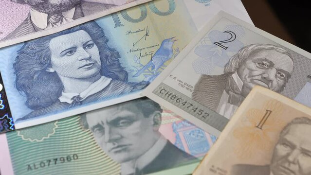 Some of the paper bills of the Estonian Kroon money on the top of the table.close-up.4K UHD