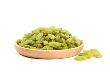  green raisins in wood plate isolated on white background