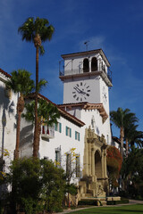 Partial view of the famous and beautiful Santa Barbara courthouse complex under blue sky