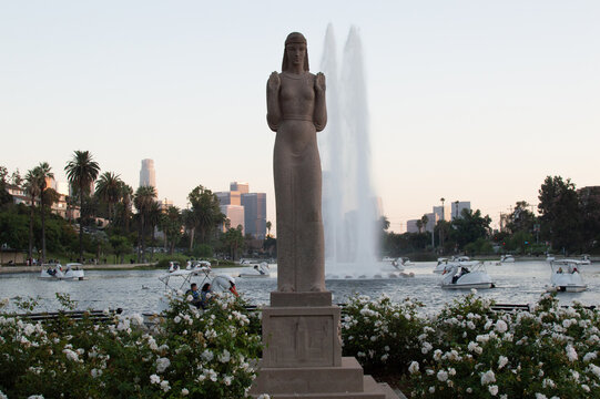 Statue In Front Of Fountain And Lake In Los Angeles, California