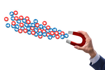 Businessman attracting likes with large magnet